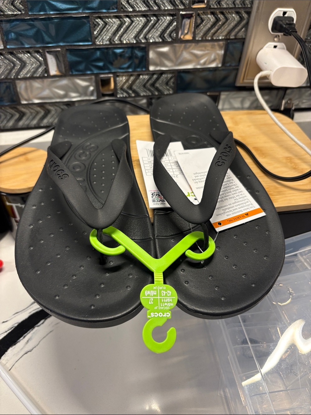 CROCS Black Flip Sandals with Neon Green Hanger